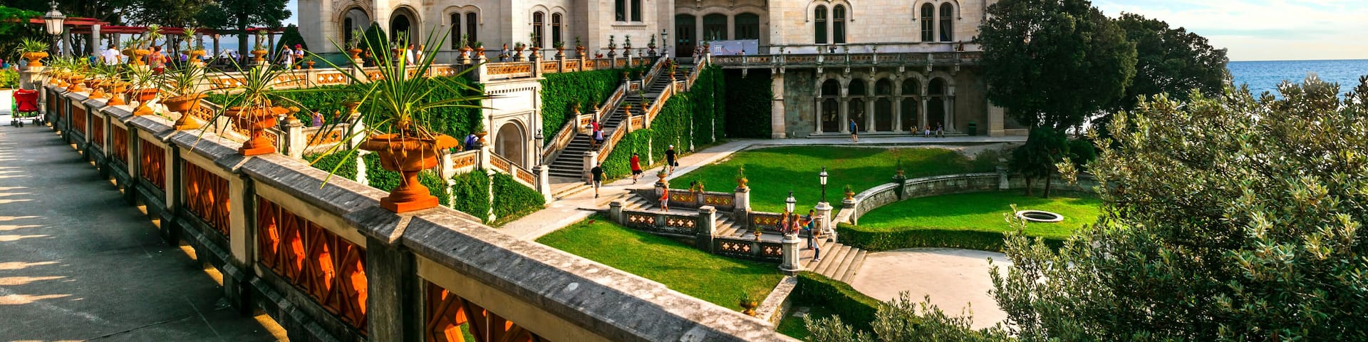 elegant Miramare Castle and its historic park on the Adriatic coast, Trieste, Italy. XIX Century white palace by the sea.