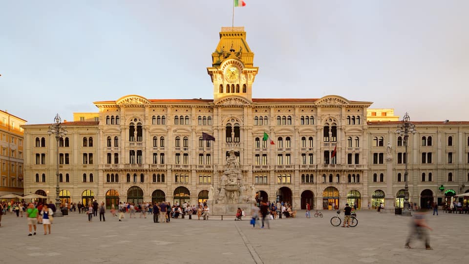 Palazzo del Municipio featuring a sunset, heritage architecture and an administrative buidling