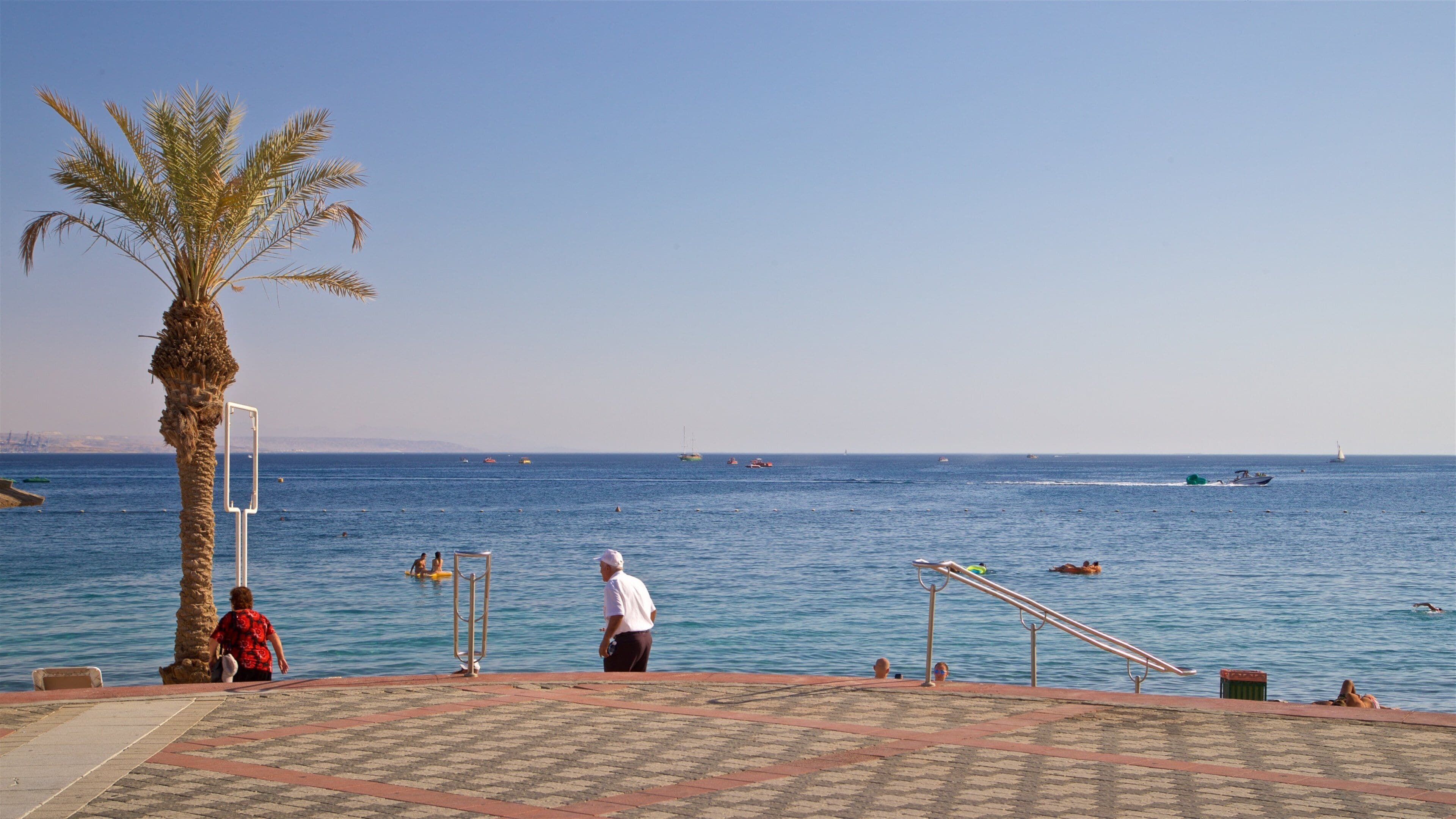 Green Beach which includes general coastal views as well as a small group of people