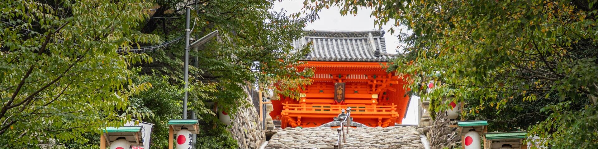 Isaniwa Shrine featuring a garden as well as a couple