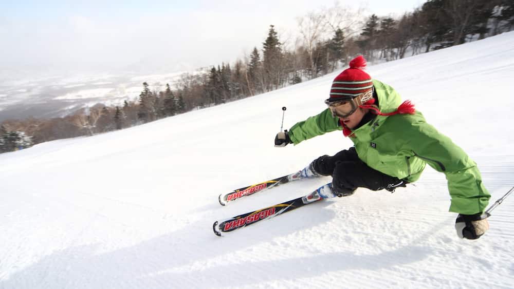 Appi Kogen Ski Resort which includes snow and snow skiing as well as an individual male