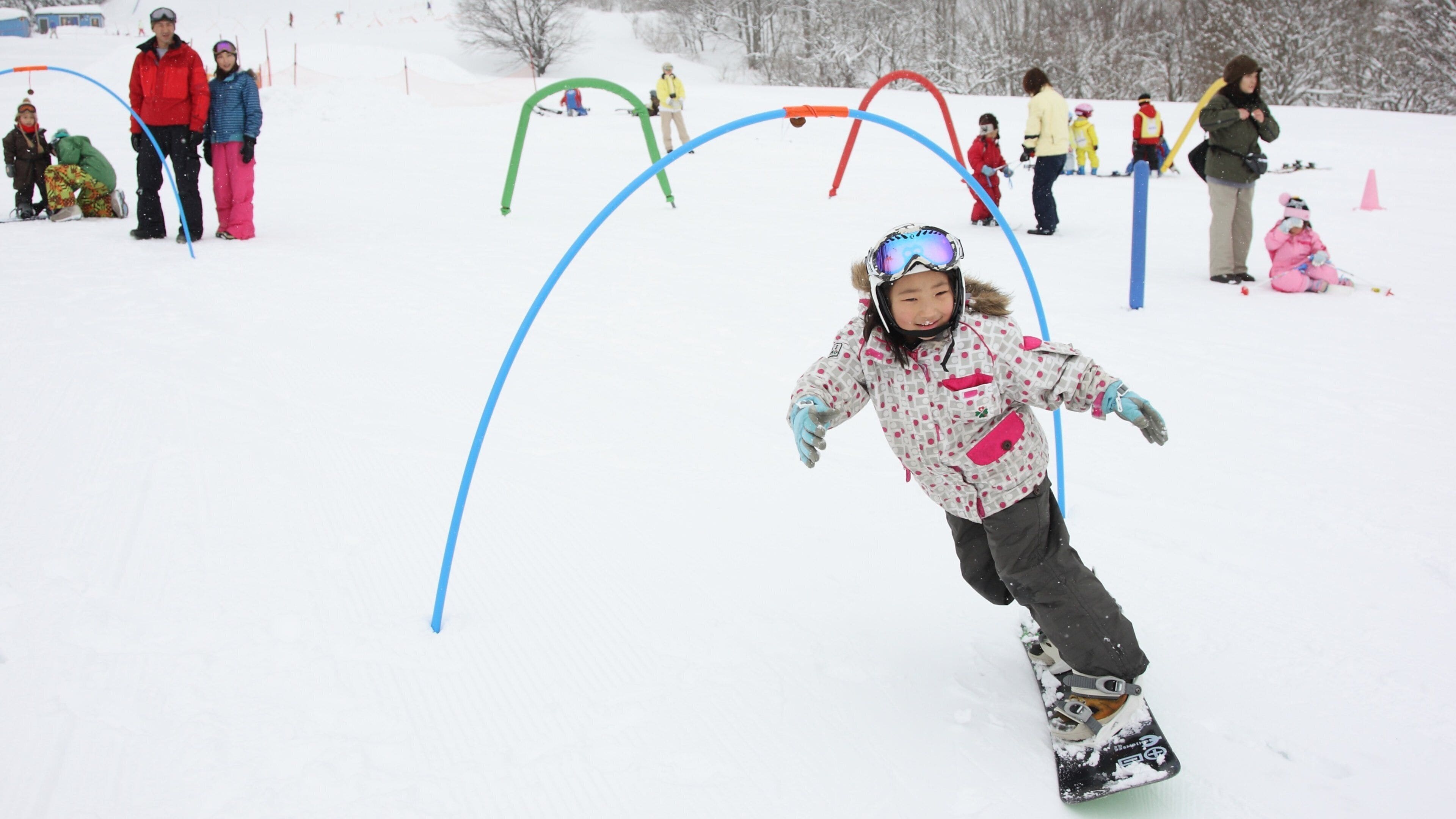 Appi Kogen Ski Resort which includes snowboarding and snow as well as an individual child