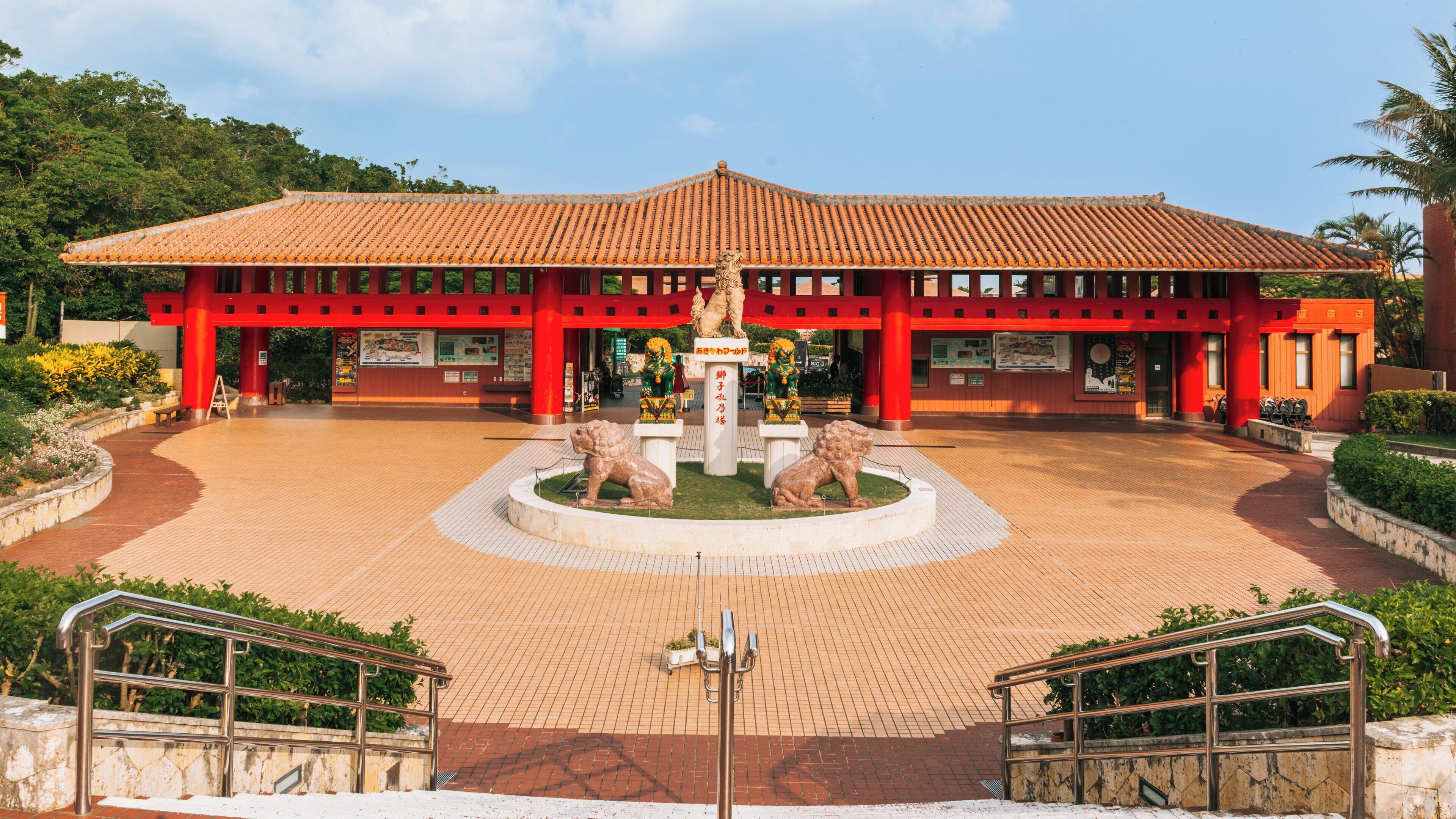 Explore Okinawa World, a cultural theme park in Naha, Okinawa Prefecture, showcasing traditional crafts, local delicacies, and stunning architecture amidst lush surroundings