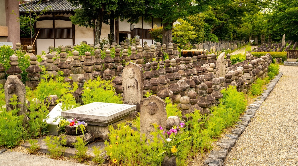 Gango-ji Temple featuring heritage elements and wildflowers
