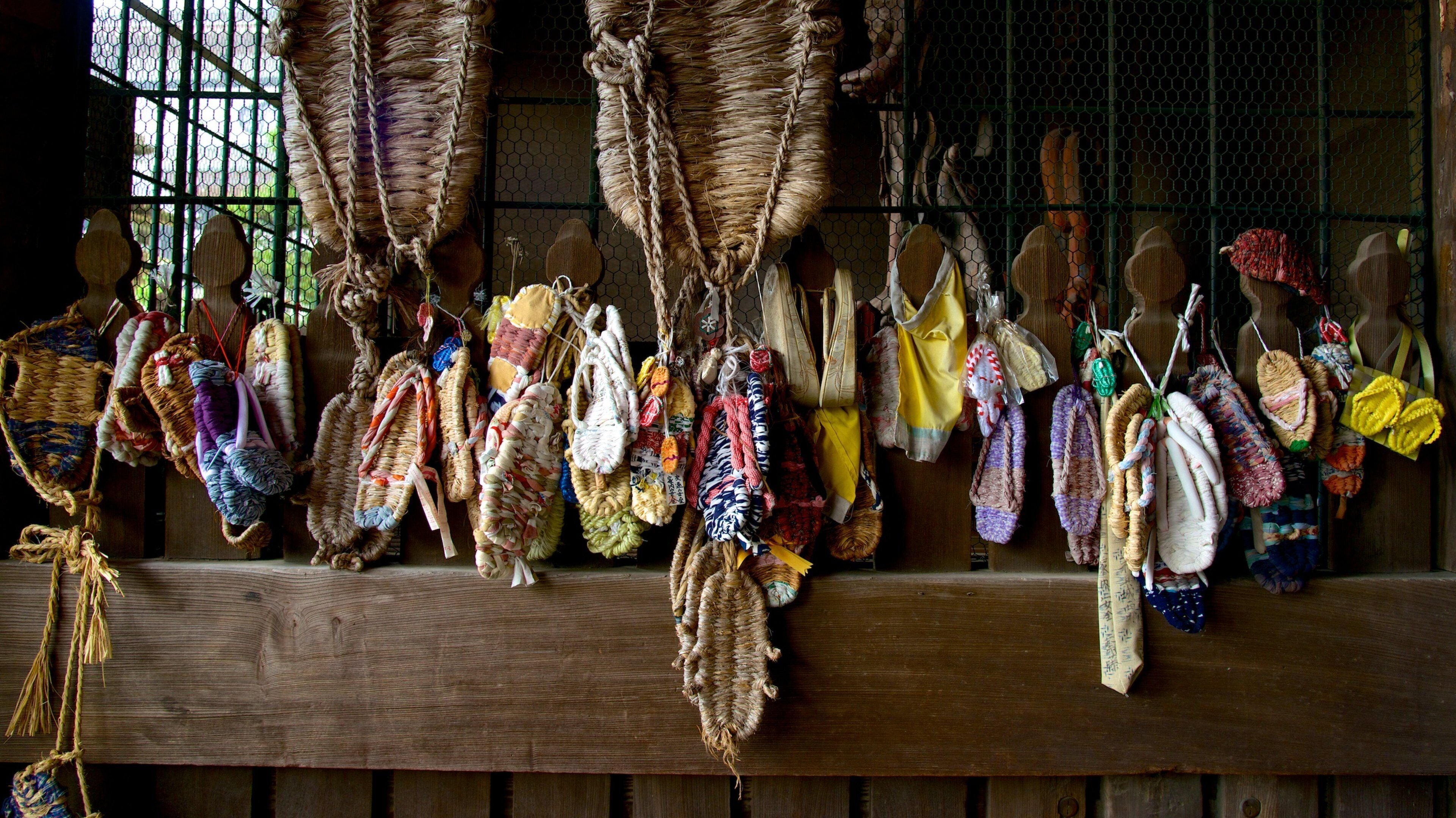 Naritasan Shinshoji Temple featuring interior views, religious elements and a temple or place of worship
