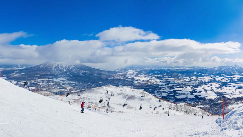 Ski slopes with a snow volcano in the background (Niseko, Hokkaido, Japan)