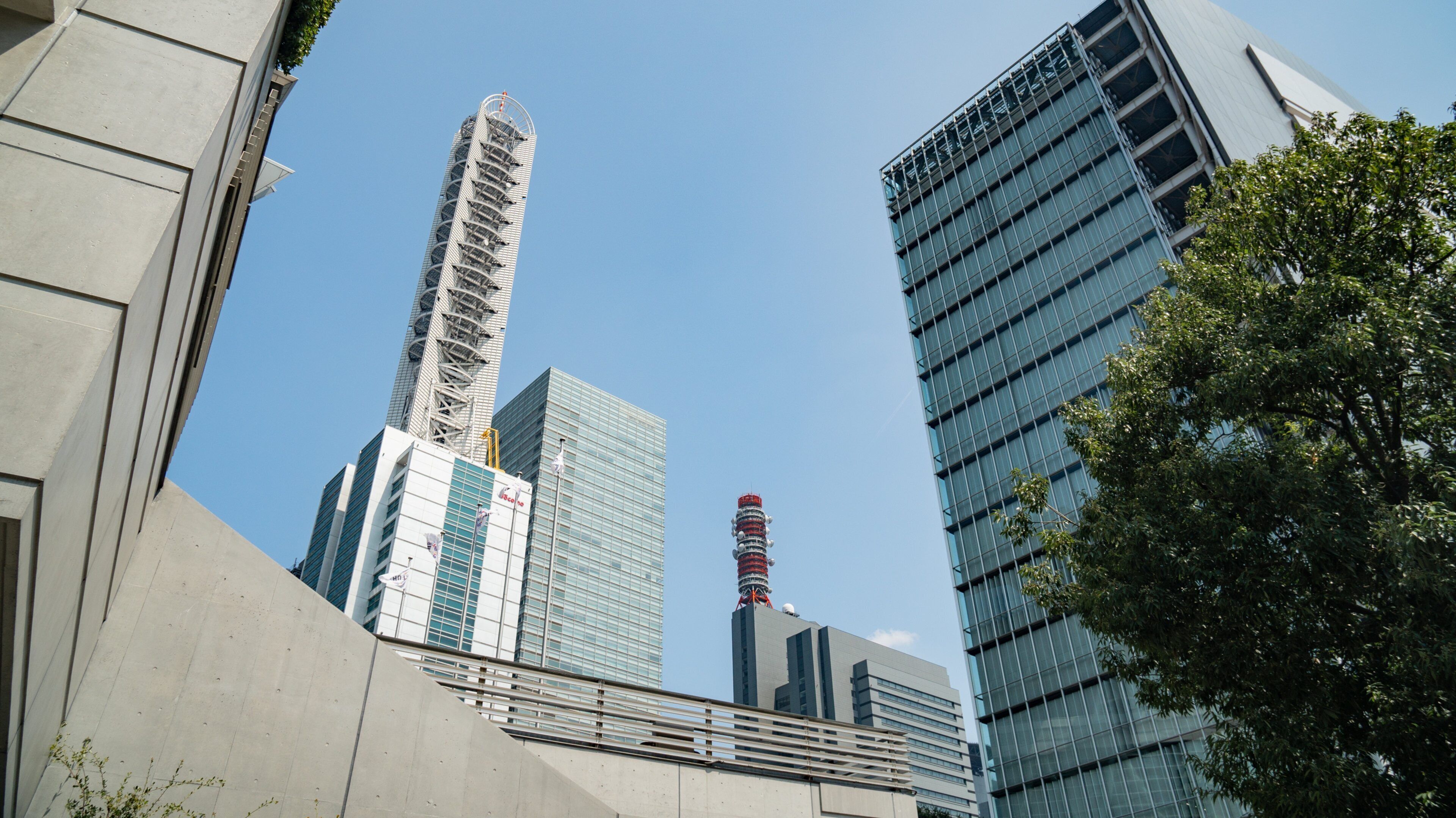 Saitama Super Arena which includes a high rise building and a city