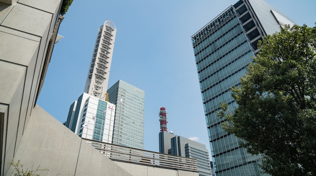 Saitama Super Arena which includes a high rise building and a city