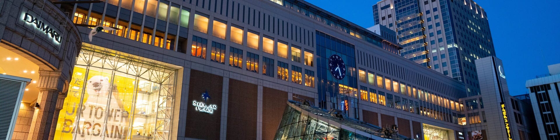 Sapporo JR Tower featuring a city and night scenes