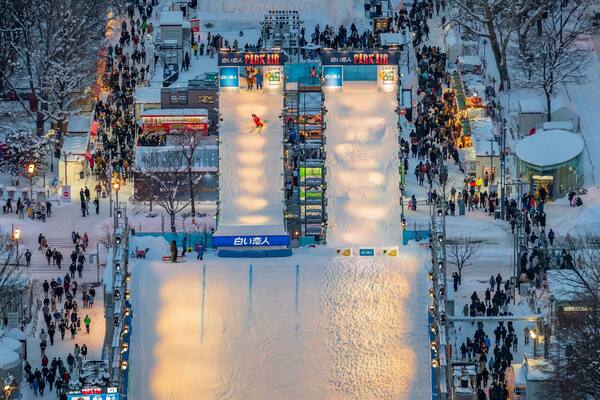 Sapporo TV Tower showing snow, night scenes and landscape views
