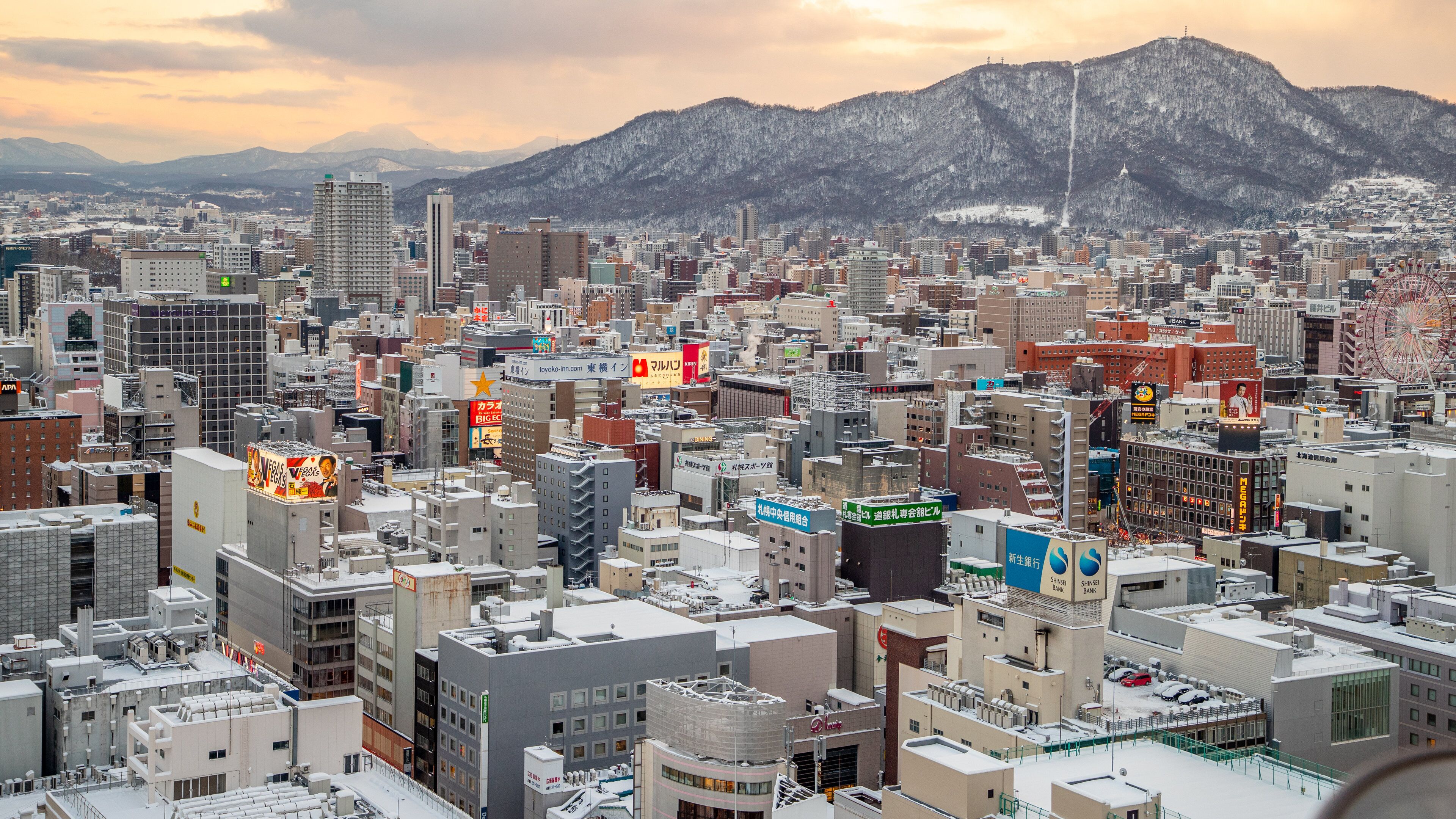 Sapporo TV Tower featuring a city, a sunset and landscape views