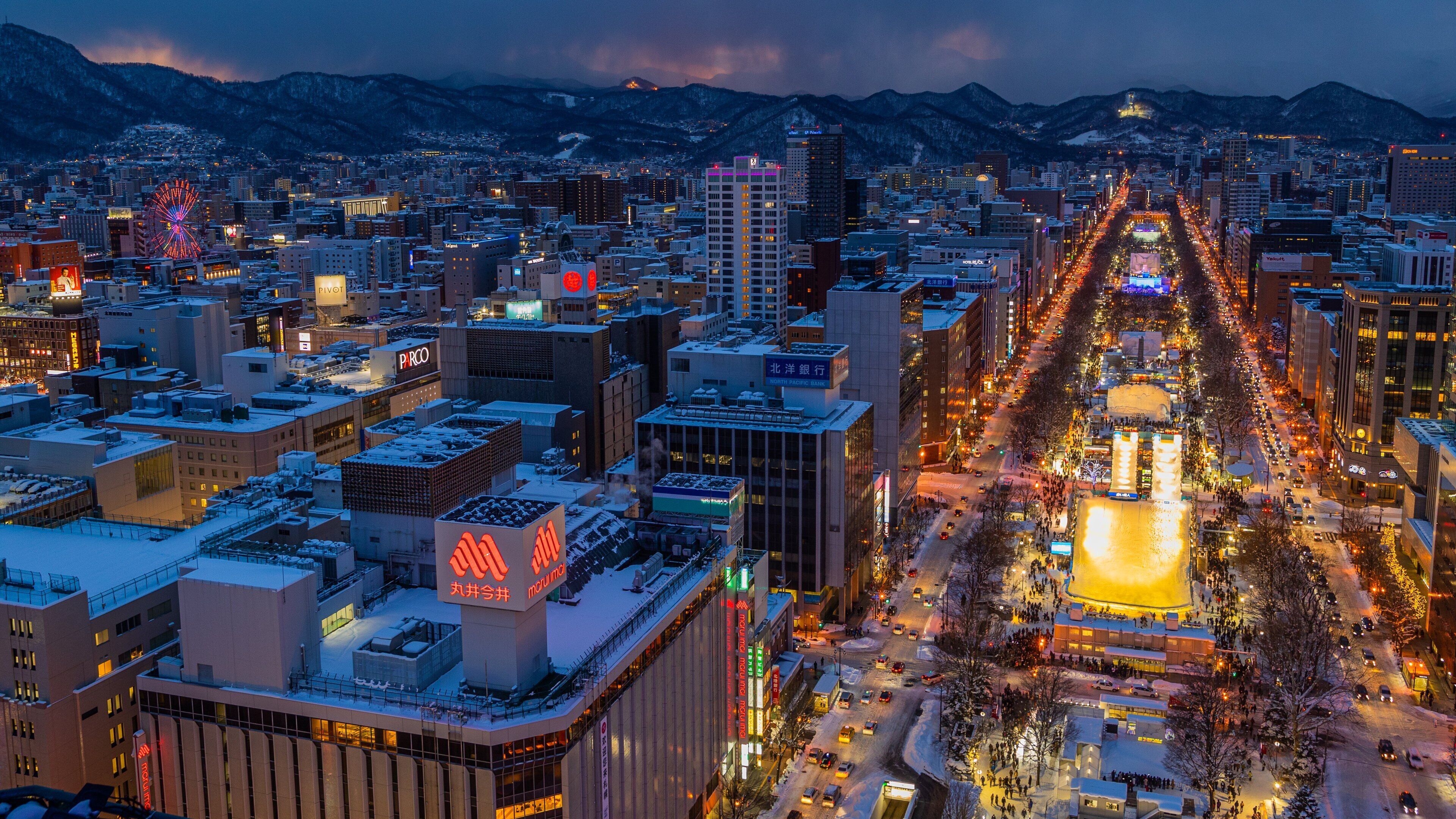 Sapporo TV Tower showing landscape views, a city and night scenes