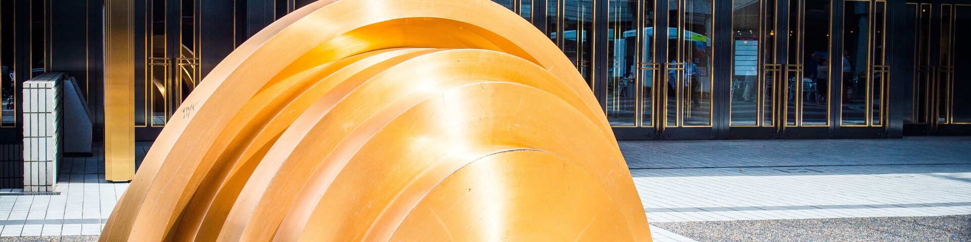 gold object at suntory music hall,tokyo,japan