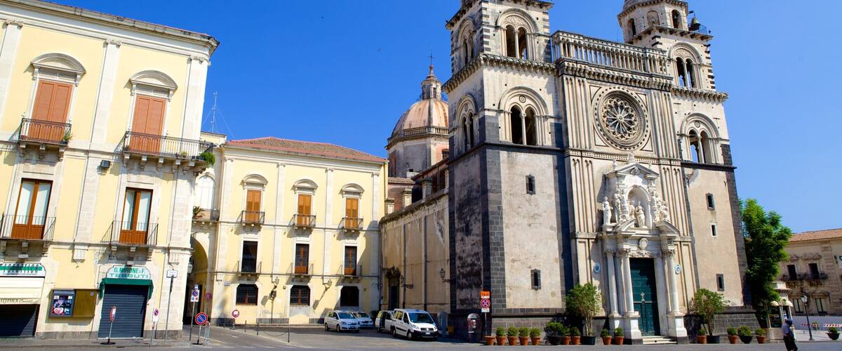 Piazza del Duomo featuring a church or cathedral and heritage architecture