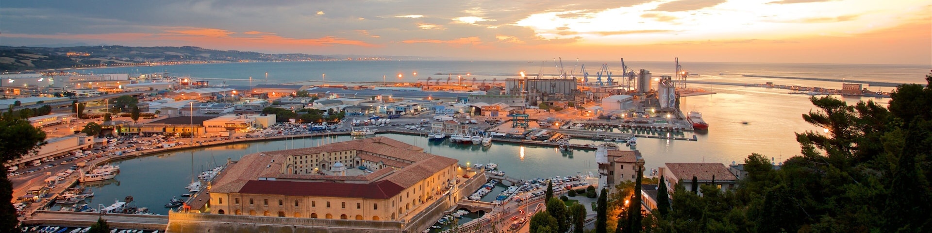 Mole Vanvitelliana which includes general coastal views, a marina and landscape views