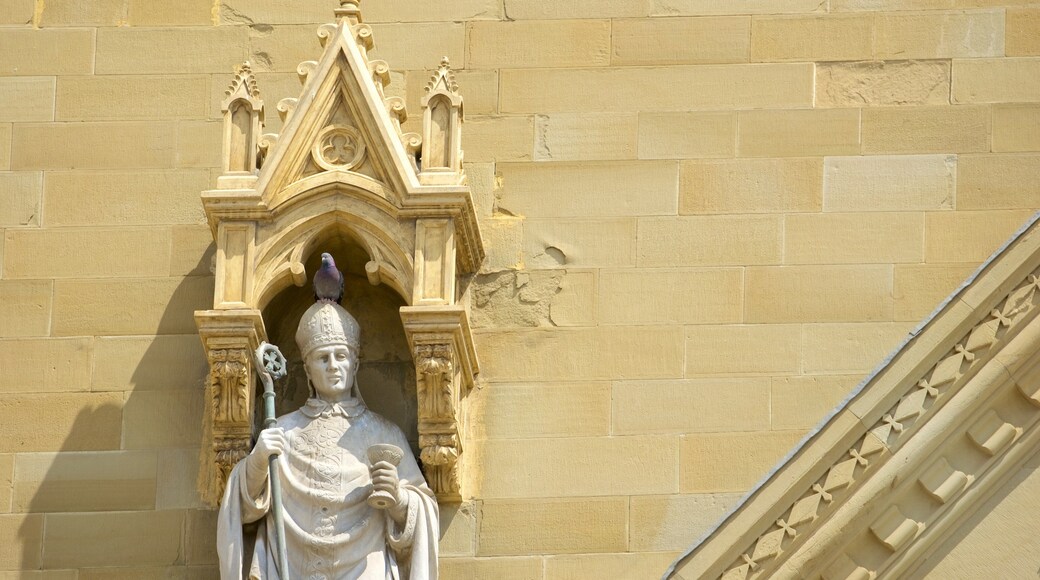 Cathedral of Saints Peter and Donato showing heritage architecture and a statue or sculpture