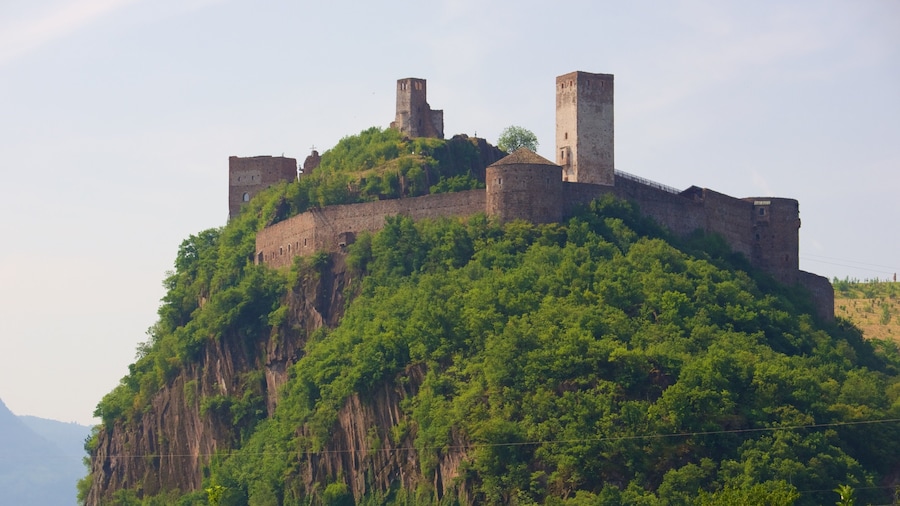 Castel Firmiano which includes mountains and chateau or palace