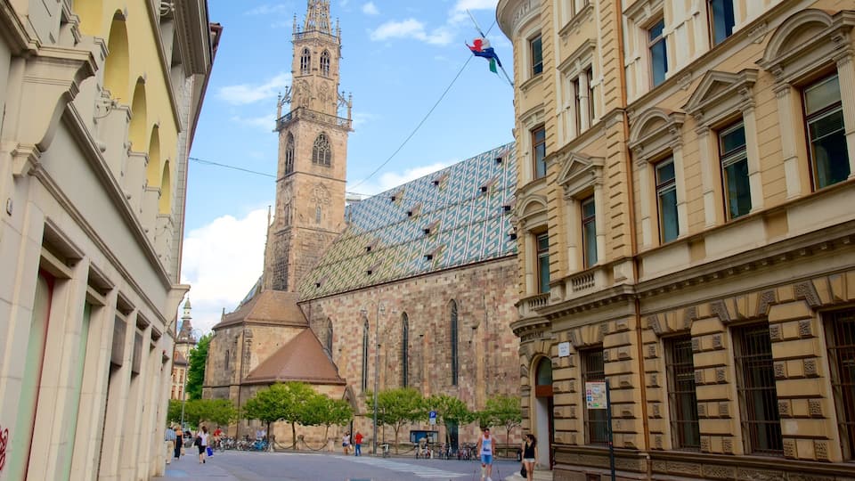 Cathedral of Bolzano which includes a church or cathedral and street scenes