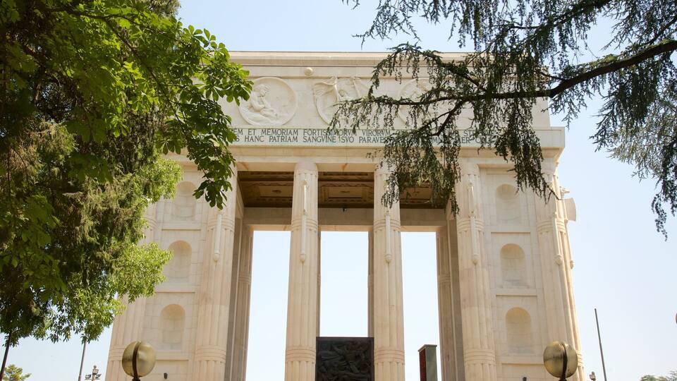 A large stone monument with inscriptions and columns.