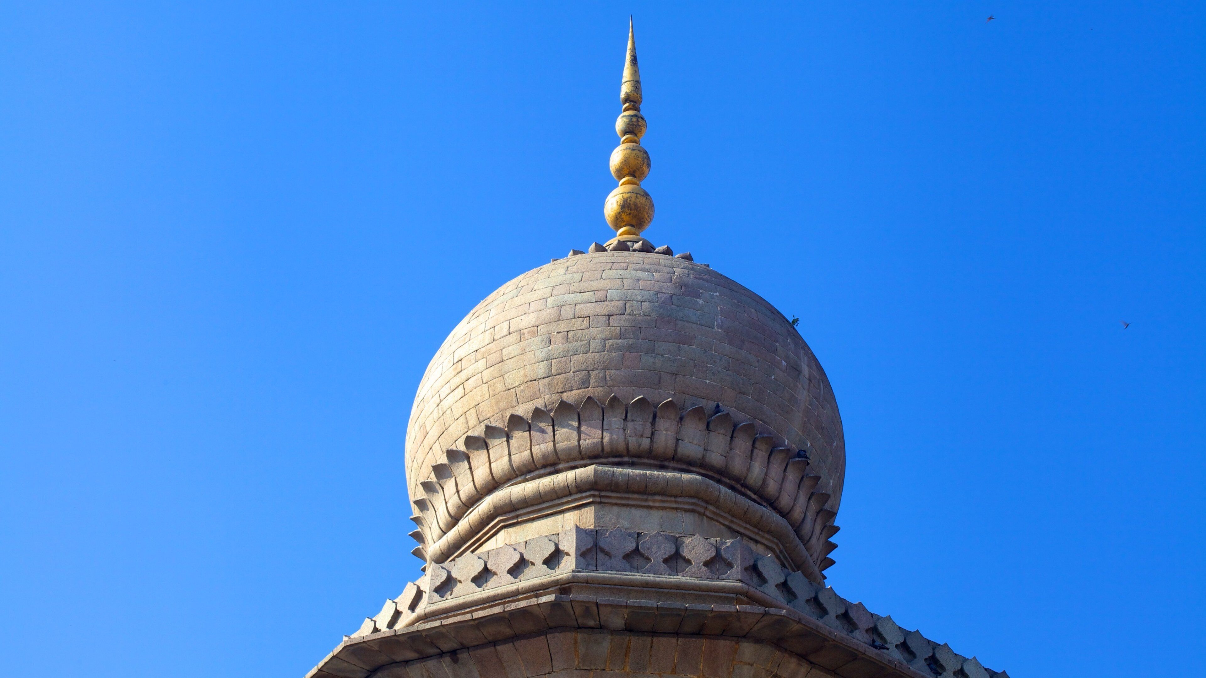 Mecca Masjid featuring a mosque and heritage architecture