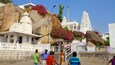 Birla Mandir Temple featuring a temple or place of worship as well as a large group of people
