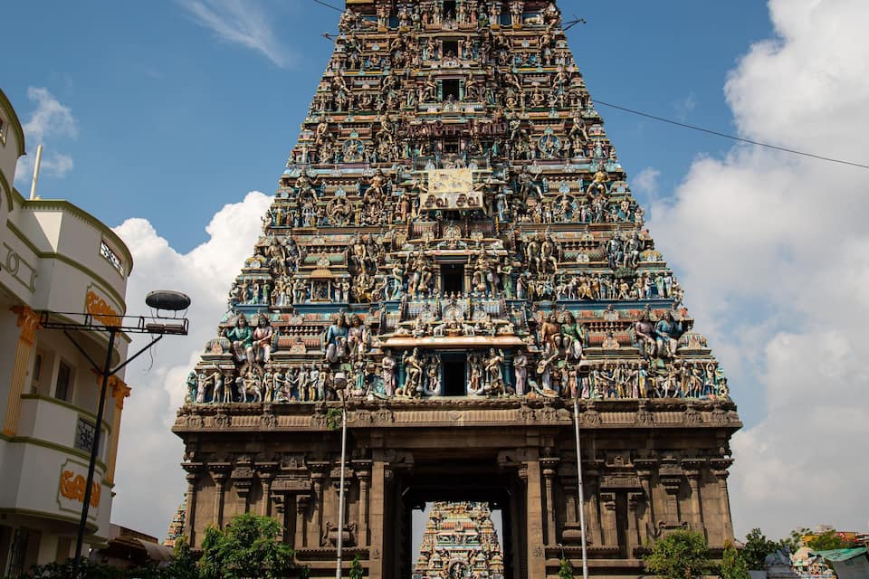 A detailed temple with intricate carvings and statues.
