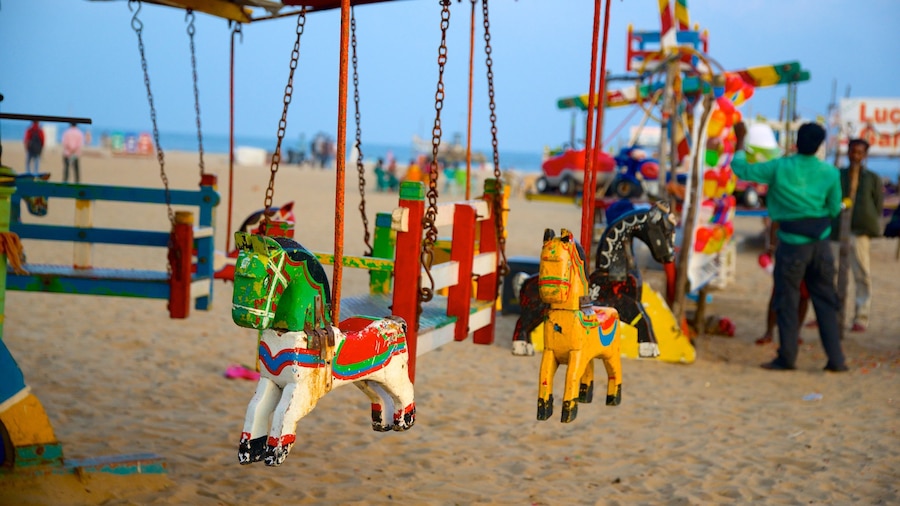 Elliot\'s Beach which includes a playground and a beach