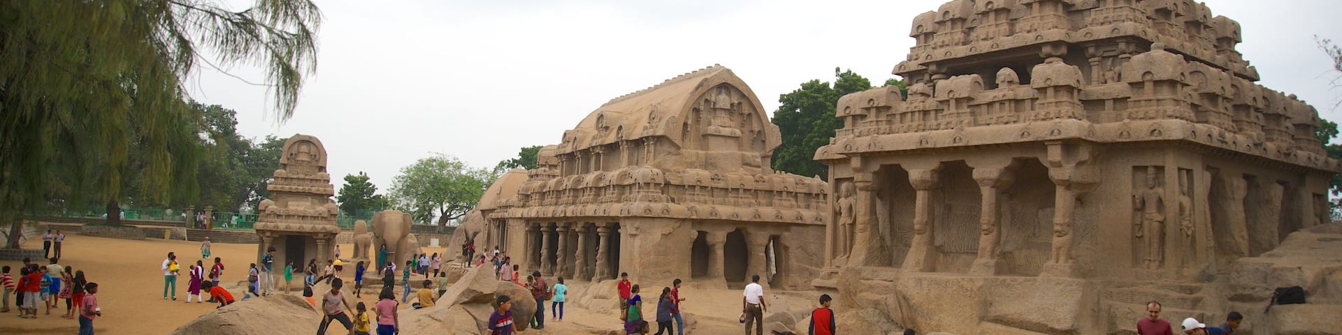 Pancha Pandava Rathas featuring heritage elements as well as a large group of people