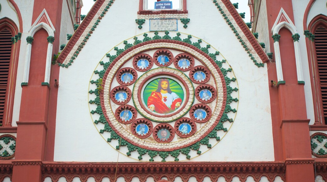 Sacred Heart of Jesus featuring a church or cathedral and religious elements