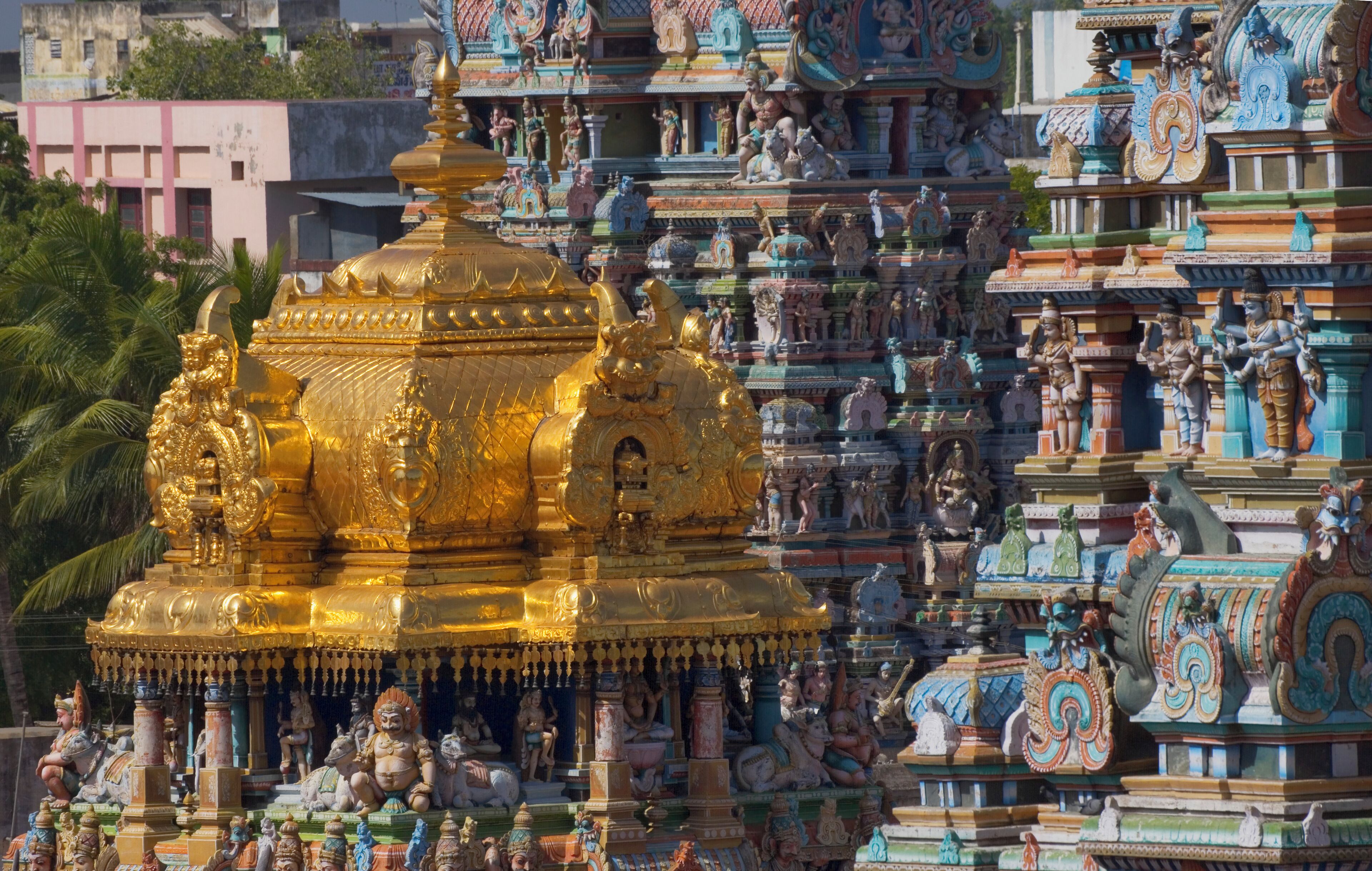 India, Madurai, Sri Meenakshi Temple, carvings and gold roof, close-up