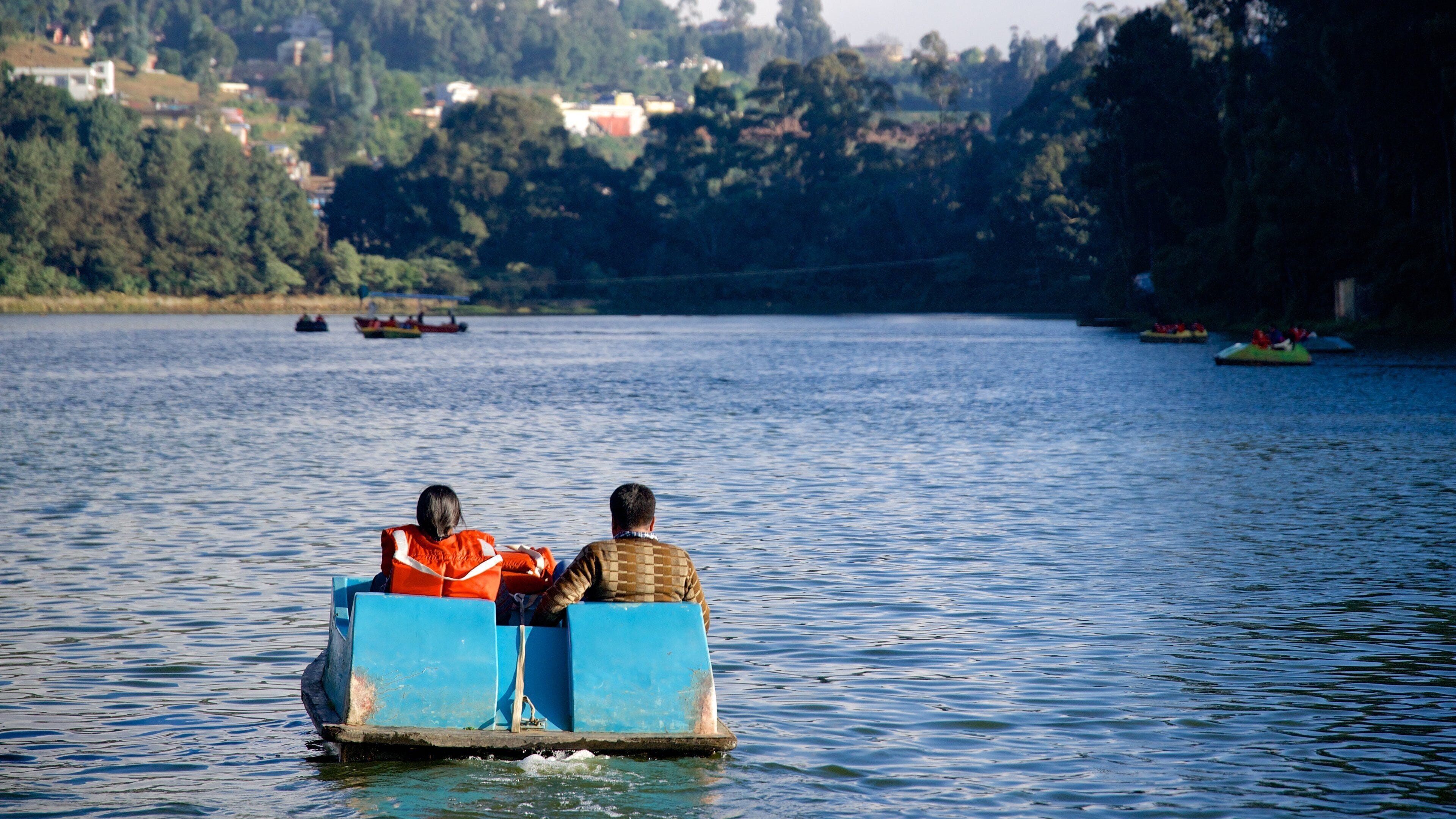 Ooty Lake which includes water sports and a lake or waterhole as well as a couple