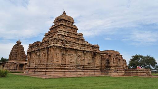 The Mallikarjuna temple at Pattadakkal was commissioned to be built by King Vikramaditya's younger wife Trailokamahadevi. It's dedicated to Lord Shiva and has ornate carvings from Ramayana, Mahabharata and other texts on its walls.