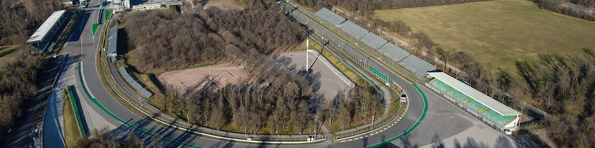 Aerial view of The Autodromo Nazionale of Monza, that is a race track located near the city of Monza, north of Milan, in Italy. Birds eye and drone shot of the circuit of Monza, near Villa Reale.