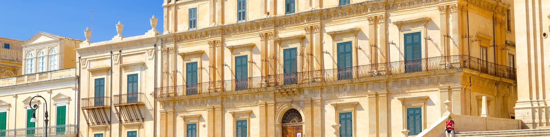 Ducezio Palace which includes street scenes and heritage architecture