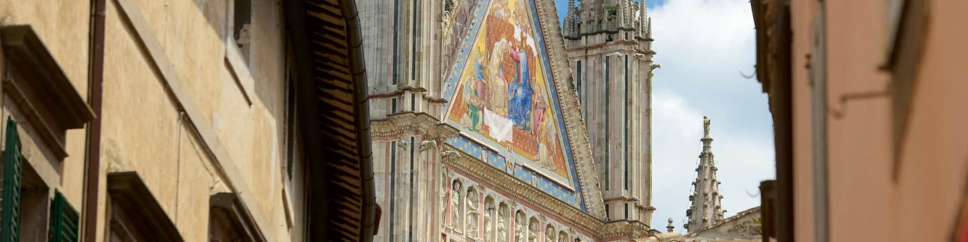 Duomo di Orvieto showing a church or cathedral, religious elements and heritage architecture