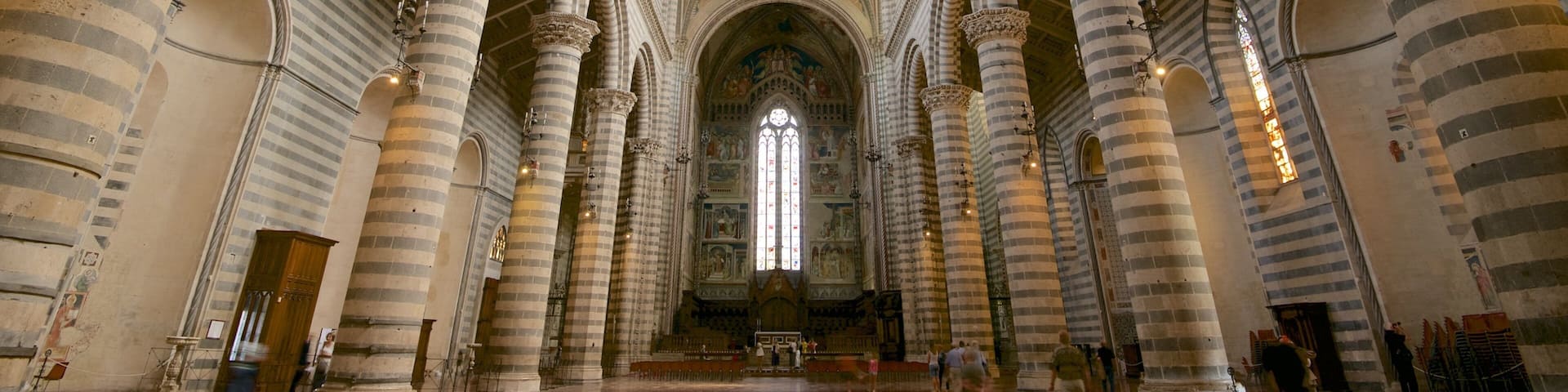 Duomo di Orvieto showing interior views, heritage architecture and a church or cathedral
