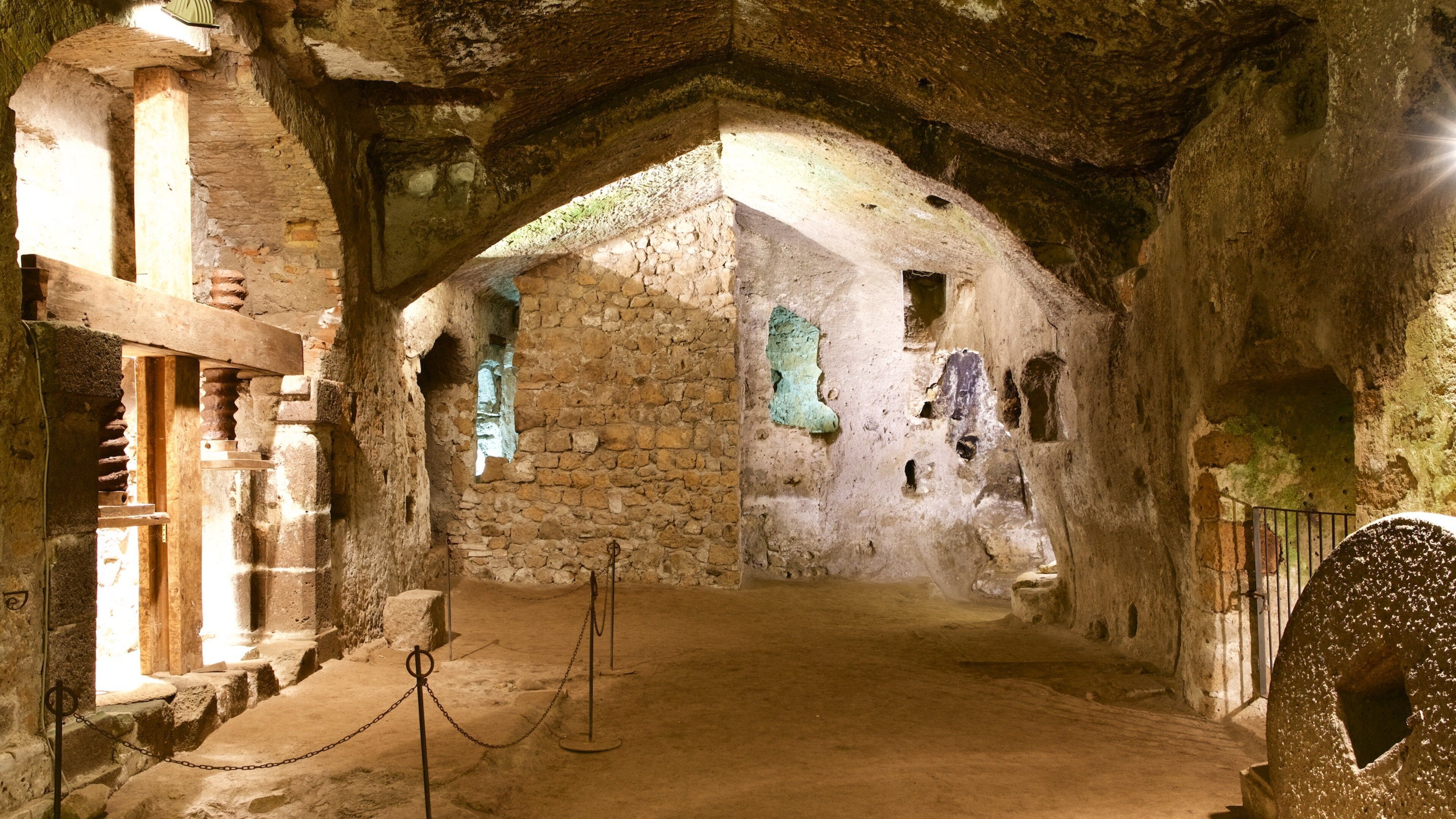 Orvieto Underground featuring a ruin and interior views