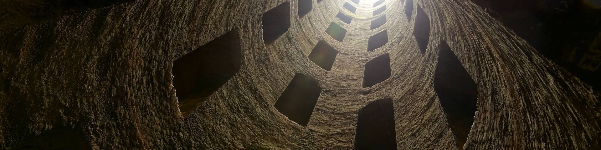 A spiral structure with a central light source.
