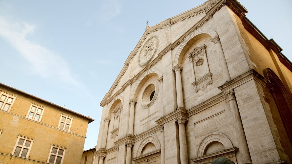 A historic building with arched windows and intricate carvings.