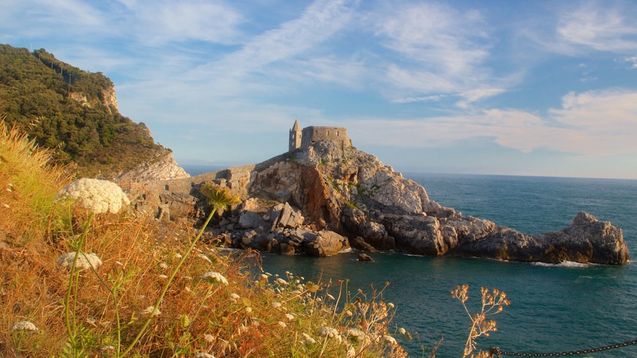 Church of St. Peter featuring general coastal views and rugged coastline