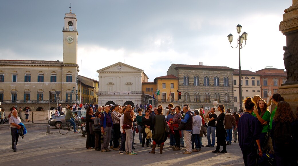 Palazzo Pretorio which includes a city, a square or plaza and heritage architecture