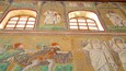 A mosaic with religious figures and architectural elements.