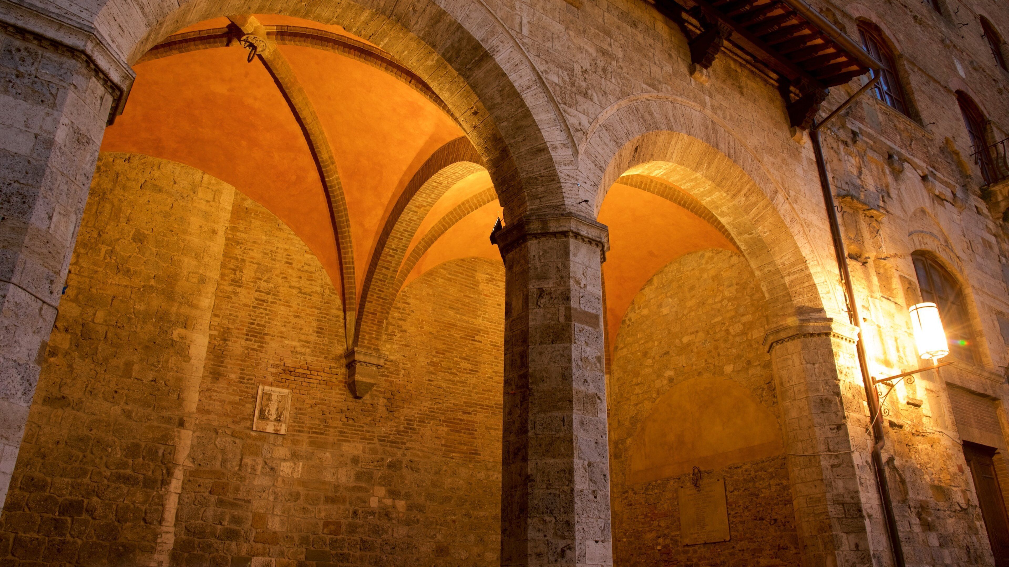 Piazza Duomo featuring heritage elements and night scenes