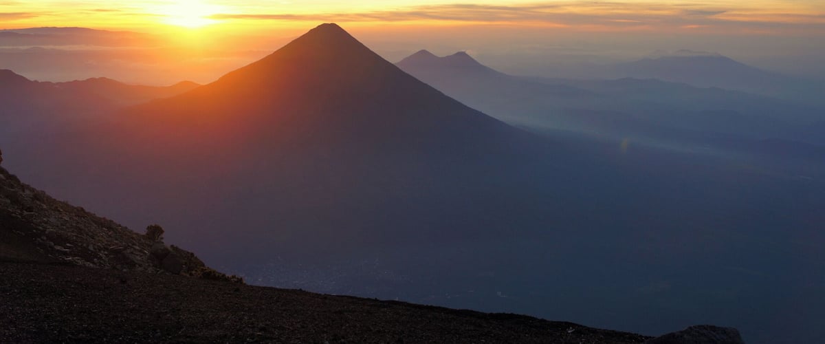 At 5am, we're hiking up to the summit of Acatenango, we're exhausted, our foot sinks a couple centimetres each step we take, the wind is absolutely freezing, and we're 3900m high. But you know what, it's totally worth it for the sunrise.