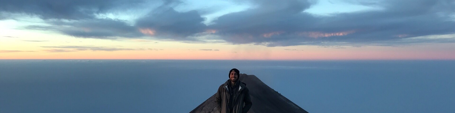 #AboveItAll standing on Volcán Acetenango at an elevation of 5,000 meters with Volcán de Fuego behind me in beautiful Guatemala