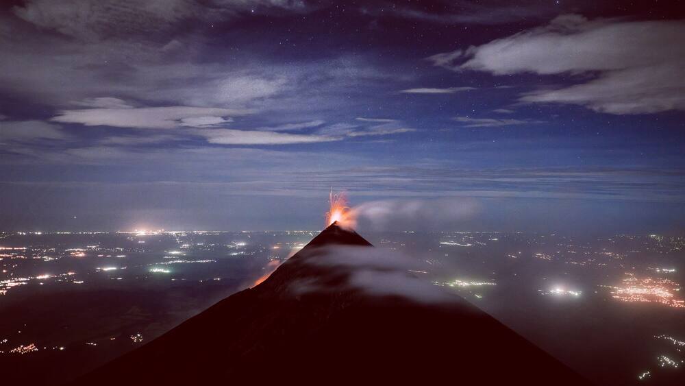 what a perfect night on #volcanacatenango close to Antigua Guatemala. we had our camp set up inside the crater, fought the most gusty winds I have ever seen but finally got this amazing view of #volcanfuego erupting lava into the dark night. all worth it!