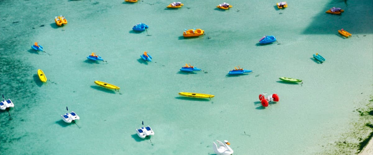 Tumon Beach which includes tropical scenes and a sandy beach