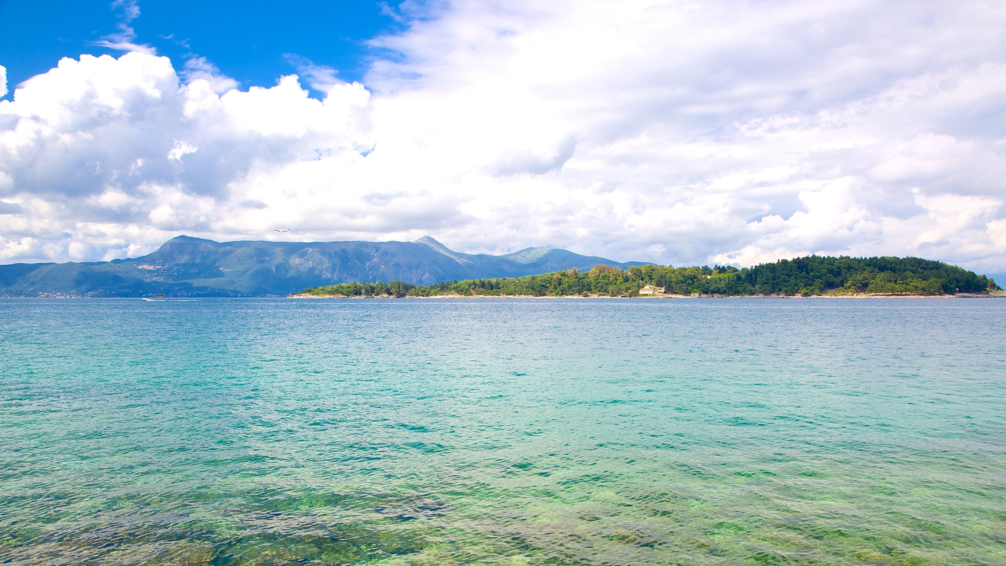Mount Pantokrator which includes mountains, general coastal views and landscape views