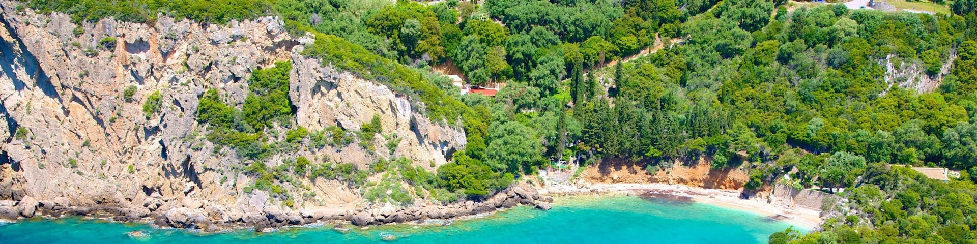 Paleokastritsa Beach which includes rocky coastline