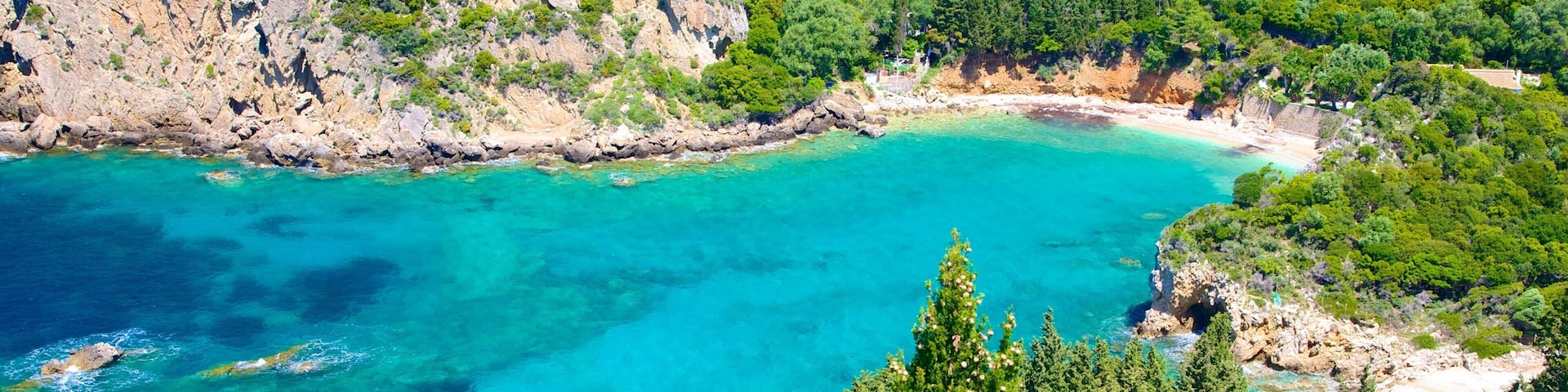 Paleokastritsa Beach which includes rocky coastline
